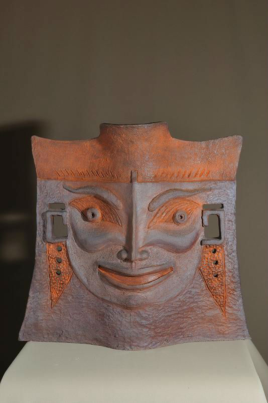 sculpture face asiatique face rieur face pleur